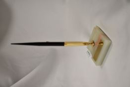 A Sheaffer lever fill desk pen on onyx stand