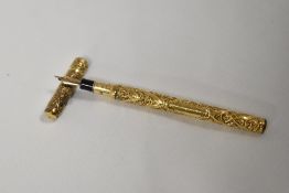 A Mabie Todd Swan No2 Chatelaine gold filled Snail with lozenge design dipping pen having bayonet