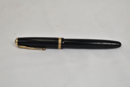 A Parker Duofold button fill fountain pen in black with single decorative band to the cap having