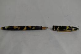 A Sheaffer Balance lever fill fountain pen in black/pearl with single band and no spot to the cap