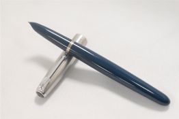A Parker 51 aeromatic fill fountain pen in teal with lustiloy cap. Approx 13.8cm in very good