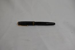 A Parker Vacumatic piston fill fountain pen in blue with one broad band to cap having Parker 14k
