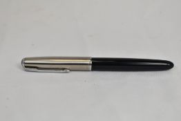 A Parker 51 aerofill fountain pen in black with lustraloy cap. In good condition