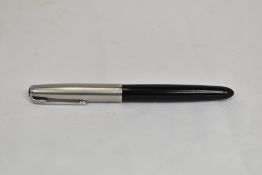 A Parker 51 button fountain pen in black with lustraloy cap. In good condition