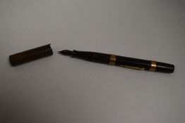A Waterman Ideal 52 lever fill fountain pen in BHR with two gold bands to barrel, damage to cap