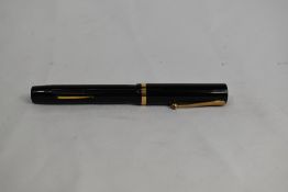 A Sheaffer Lifetime Flat Top lever fill fountain pen in black with single broad band and white