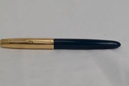 A Parker 51 aeromatic fill fountain pen in blue with rolled gold cap. Approx 13.8cm in very good