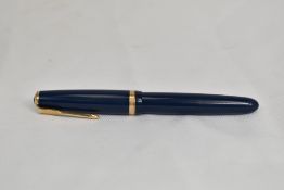 A Parker Duofold button fill fountain pen in blue with single decorative band to the cap having