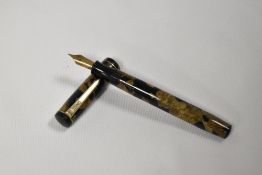 A Mentmore Diploma lever fill fountain pen in brown and black having single narrow band to the cap