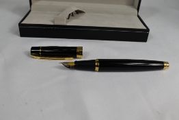 A boxed Sheaffer 300 converter fountain pen and ballpoint pen set in black having Sheaffer nib. In