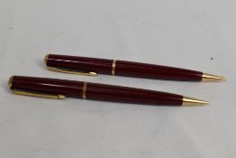 Two Parker No3 propelling pencils in red. Good condition