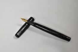 A Mabie Todd & Co Swan SM100/60 leverfill fountain pen in black hard rubber having a Swan 1 nib.