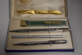 A Schlunberger ballpoint pen and mechanical pencil set, metal with refill leads and ink. Boxed, very