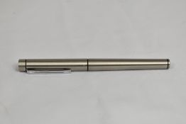 A Sheaffer Targa cartridge converter in brushed steel. In very good condition