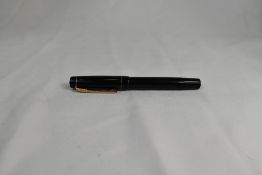 A Croxley 'The Croxley Pen' lever fill fountain pen in black with single band to cap having