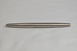 A Waterman CF converter fountain pen in brushed steel having 14ct nib. In very good condition