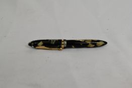 A Sheaffer Balance Lifetime petite lever fill fountain pen in black/pearl with single band and white