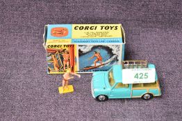 A Corgi diecast, 485 Surfing with the B.M.C Mini Countryman in light green with yellow interior,