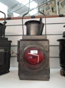 A BR (W) Railway Lamp having original bulls eye lens and carry handle, height including handle 52cm