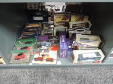 A shelf of Corgi, EFE, Days Gone and similar diecasts including boxed sets, Thrust SSC, Cadburys,