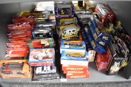 A shelf of modern diecasts including Real Toy Action City, Richmond Toy London's Burning, Super
