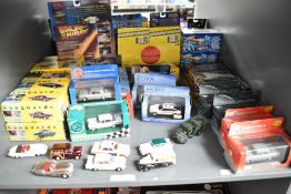 A shelf of modern diecasts including Vanguards, Lledo Vauxhall and Jaguar etc, most boxed approx