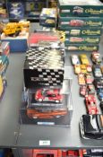 Sixteen diecast Racing Cars including Onyx, Vitesse, Scalextric, Team Slot and similar, all boxed
