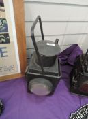 A BR Railway Lamp having front and rear bulls eye lens and carry handle, height including handle
