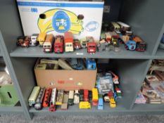 Two shelves of Corgi and similar diecasts, Trucks, Cars, Wagons, Buses etc, mainly Classics, boxes