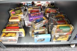 A shelf of Corgi Classics and similar diecasts, all boxed approx 30+