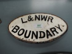 A cast metal Railway plate, L&NWR Boundary, in white with black lettering