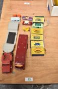 Five Lesney Matchbox diecasts, 7 Milk Float, 19 MG A Sports Car, 34 Volkswagen Camping Van, 46