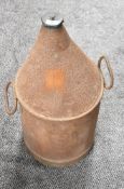 A BR (M) metal Lamp Oil Can having two carry handles