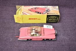 A Dinky diecast, 100 Lady Penelope's Fab 1 on inner card stand in original box, front rocket and two
