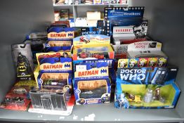 A shelf of modern TV related diecasts including DC Comics Batman, Doctor Who, Chitty Chitty Bang