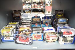 A shelf of modern diecasts inclyuding Burago, Oxford, Maisto, New Ray and similar, all boxed