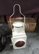 A BR (W) Railway Lamp having original bulls eye lens and carry handle, painted white, height