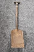 A British Railway Coal Iron Shovel having wooden handle, stamped E & W Lucas BR (NE)