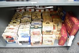 A shelf of modern Lledo diecasts including Days Gone, Queen Mothers Sets, Pro Movers etc, all