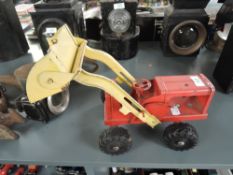 A Triang pressed steel red Tractor with yellow Loader and Bucket