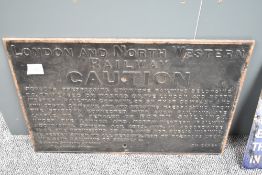 A cast metal London and North Western Railway Caution Notice, painted black