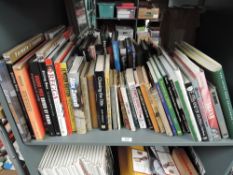 A shelf of modern Motor Racing Volumes including many Autobiography's, Reference, Novels etc also