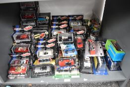 A shelf of modern diecasts including Dickie, Atlas, Elicor, Maisto etc, 40+ all boxed