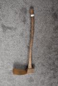 A LMS Adz marked Brades having wooden shaft