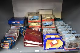 A shelf of modern diecasts including Dinky, Corgi, Matchbox, Matchbox Models of Yesteryear, all
