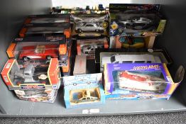 A shelf of mixed scale diecasts including 1:24 Motor Max, Ford Motor Company Licoln Limousine