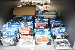 A collection of 36 Corgi James Bond 007 diecasts including Dr No, Golden Eye, The Man With The