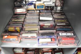A shelf of Corgi Original Omnibus and similar diecast Buses, all boxed, approx 30
