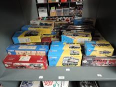A shelf of Corgi Limited Edition Classics diecasts including Buses, Trucks, Police Cars and