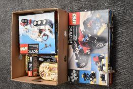 Four Lego Technics Boxed Sets, 8860, 8660 and 8700 x2, not checked for completeness along with loose